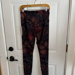 Athleta womens Leggings in gorgeous Black and Red Floral print.